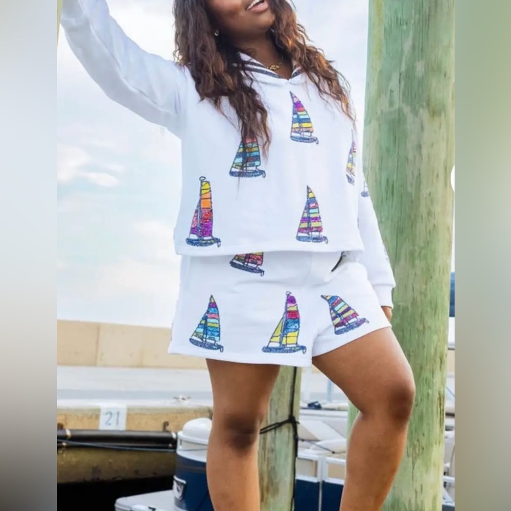 New Queen of Sparkles Sailboat Set. 
Both Size XS.